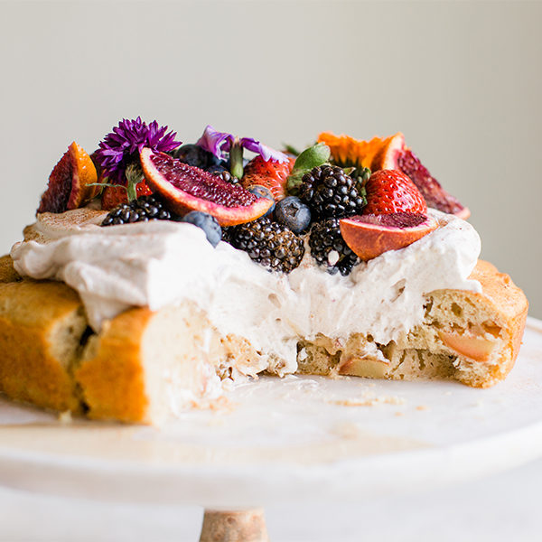 CINNAMON ENVY™ APPLE TRES LECHES WITH WHIPPED CREAM AND CALIFORNIA GIANT BERRIES